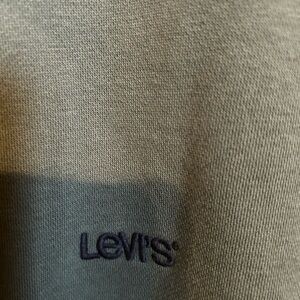 Green Levi’s sweatshirt